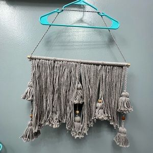 Yarn and beaded wall hanging